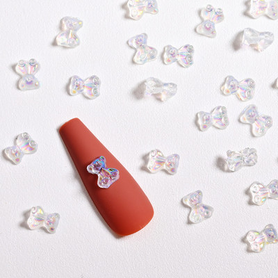 100 gab. Sveķu mirdzoša roze, plakans muguras zieds, kalnu strēles dārgakmens, arilka kamēlija, rotaslietas, kāzu figūriņas, aplikācijas, amatniecības izstrādājumi.