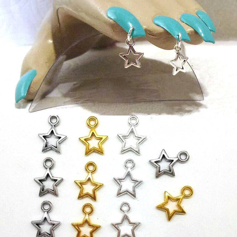 100/10gab 3D sakausējuma luksusa sudraba zvaigžņu nagu piekariņi dobi pīrsingi, piekaramie rotaslietas nagu mākslas rotājumi, DIY kulonu manikīrs