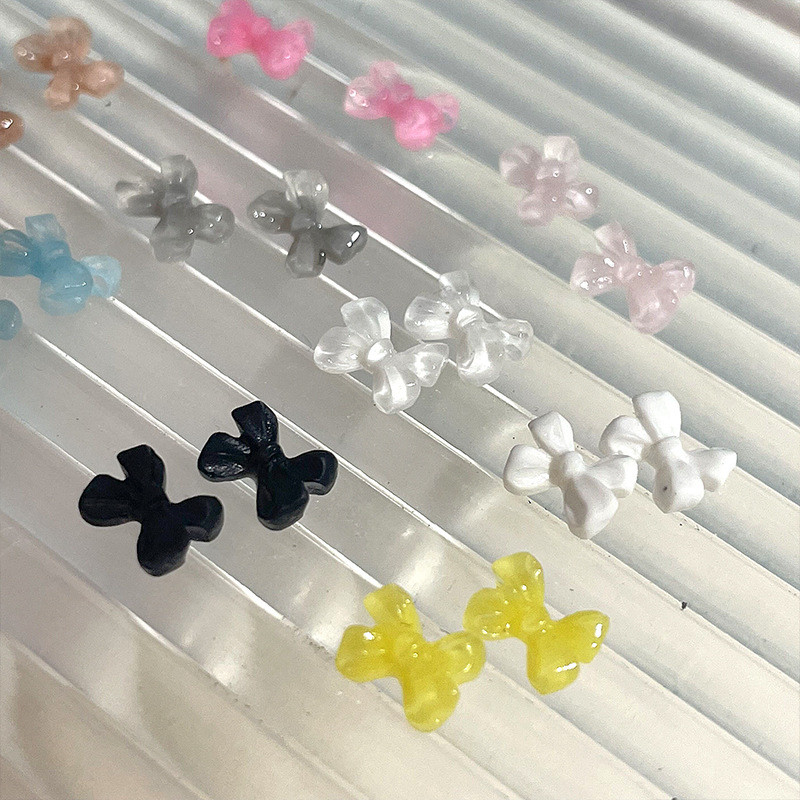 20Gb Mini 6*4,5 mm Nail Art Caurspīdīga Plakana Sirds Bowknot Juvelierizstrādājumi Želejas Sveķu Bowtie 3D Nail Art Decoration Nagu mākslas aksesuāri