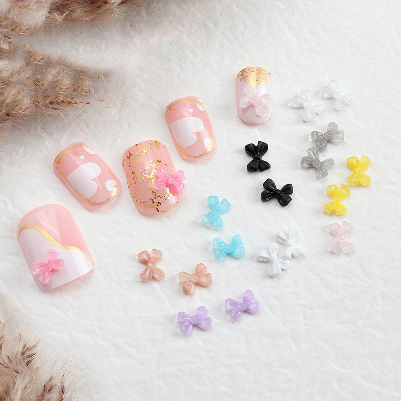 20Gb Mini 6*4,5 mm Nail Art Caurspīdīga Plakana Sirds Bowknot Juvelierizstrādājumi Želejas Sveķu Bowtie 3D Nail Art Decoration Nagu mākslas aksesuāri