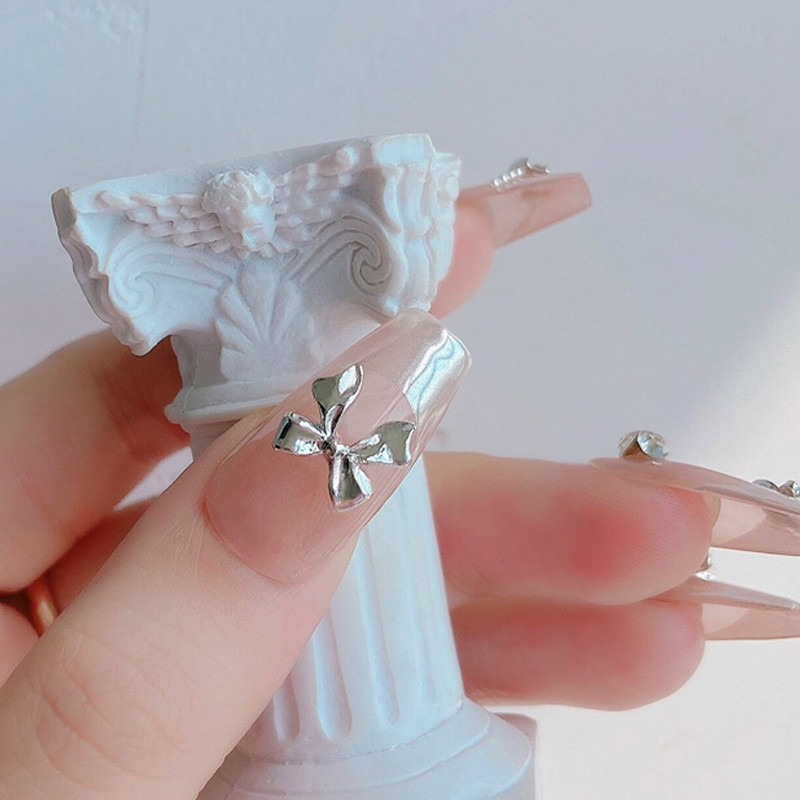 10 gab. Jaukti metāla sakausējums Bownot Naglas Māksla Dekorācija Sliver Gold Nail Piekariņi DIY Manikīrs Dizains Rotaslietas Aksesuāri Instrumenti