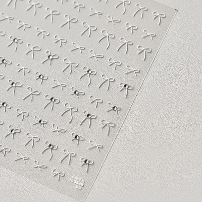 1gab 3D plānas melnbaltas mazas bantītes lentes bantes nagu uzlīmes Augstas kvalitātes līmējošās uzlīmes nagu mākslas apdare T-3604