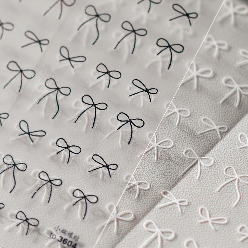 1gab 3D plānas melnbaltas mazas bantītes lentes bantes nagu uzlīmes Augstas kvalitātes līmējošās uzlīmes nagu mākslas apdare T-3604