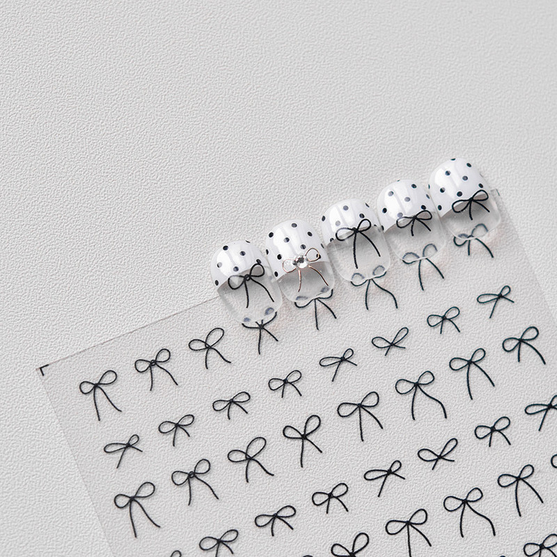 1gab 3D plānas melnbaltas mazas bantītes lentes bantes nagu uzlīmes Augstas kvalitātes līmējošās uzlīmes nagu mākslas apdare T-3604