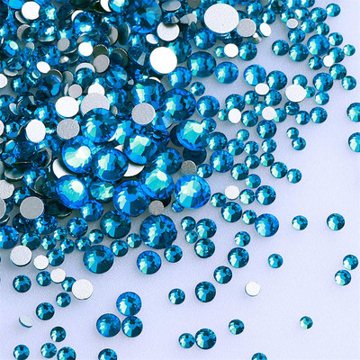 1440 gab./iepakojumā jaukta izmēra stikls plakana aizmugures kalnu strēles mirdzoša, apaļa, zila dimanta līme bez fiksācijas līme uz rhinestones, lai izgatavotu nagu mākslu.