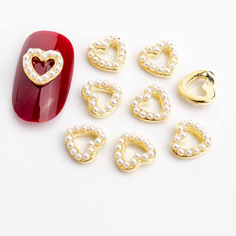 10 gab. Sudraba sirds sakausējuma nagu mākslas šarms 3D jūrnieks metāla dimanta pērle doba sirds mīlestība nagu rotaslietas grezni nagu aksesuāri