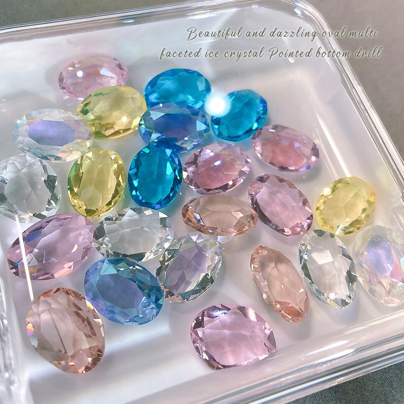 10 gab. Lieli ovāli nagu kristāla rotaslietas ar smailu dibenu, burvīgi dimanta rotājumi. Luksusa augstas caurspīdīguma manikīra rotājumi