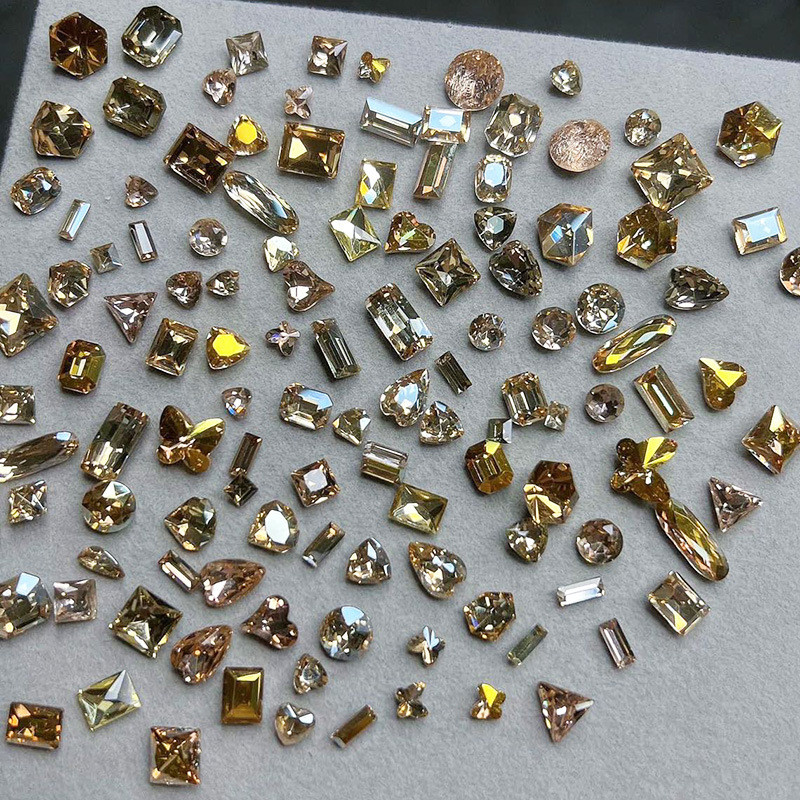 50Pcs/Lot Multi-Shapes Nail Art Svjetlucavi kamenčići Sjajno staklo sa zašiljenom stražnjom stranom DIY Dragulji Kamenje za Nail Art 3D Dodaci Privjesci