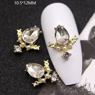 10GAB Luksusa sakausējuma nagu mākslas planēta Rhinestone piekariņi Nagi dekorēšanas piederumi Planet Cross Juvelierizstrādājumu aksesuāri Manikīra daļas