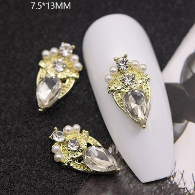 10GAB Luksusa sakausējuma nagu mākslas planēta Rhinestone piekariņi Nagi dekorēšanas piederumi Planet Cross Juvelierizstrādājumu aksesuāri Manikīra daļas