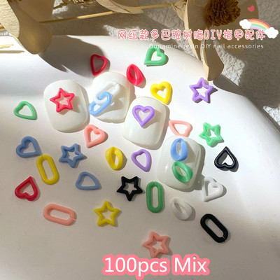 100kom/vreći Mješoviti šareni ukrasi za uređenje noktiju Izdubljena zvijezda i srce Mat šarm Dodaci za uređenje noktiju Materijal od smole