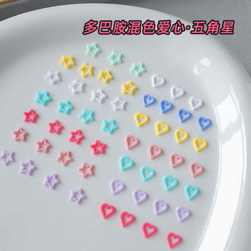 100kom/vreći Mješoviti šareni ukrasi za uređenje noktiju Izdubljena zvijezda i srce Mat šarm Dodaci za uređenje noktiju Materijal od smole