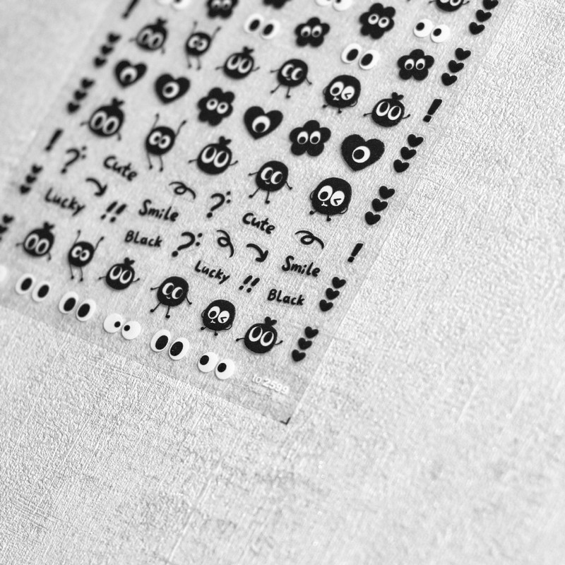 Kawaii Lucky Smile Black Coal Carbon Eye Naljepnica za nokte Japanska naljepnica za nokte Ljepilo Visokokvalitetni ukrasi za manikuru