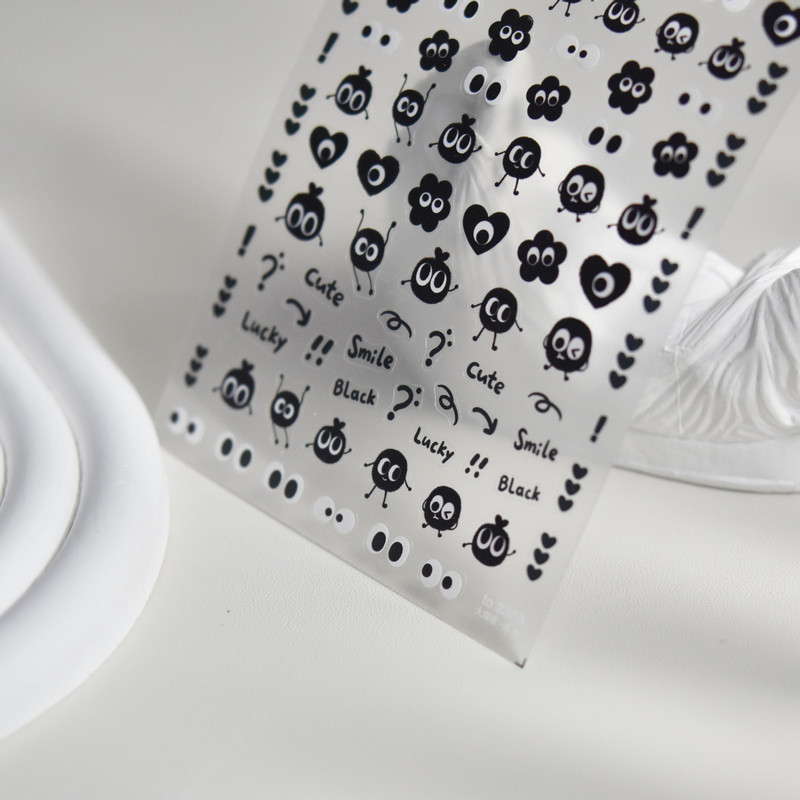 Kawaii Lucky Smile Black Coal Carbon Eye Naljepnica za nokte Japanska naljepnica za nokte Ljepilo Visokokvalitetni ukrasi za manikuru