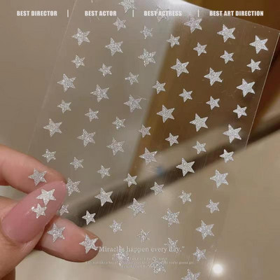 1Gb Laser Starburst Star līmējošā nagu uzlīme 3D nagu mākslas rotājums mirgojošs sudraba liesmas tauriņš nagu uzlīme, kas uzspiež uz nagiem