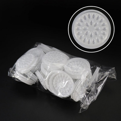 100 gab. Līmes blīve Skropstu līmes turētājs Līmējošā palete Skropstu pieaudzēšanas līmes paliktņi, kas stāv uz skropstu plastmasas turētāja aplauzuma instrumenti