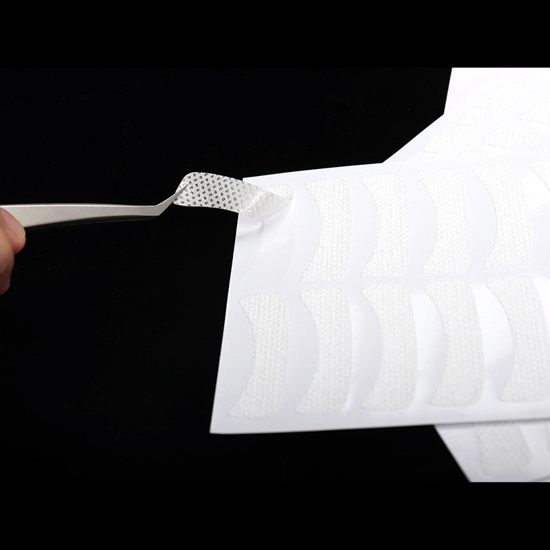 50 porų blakstienų pagalvėlės neaustiniai audiniai Daugiafunkcis švelnus, kvėpuojantis priauginamas blakstienų priauginimas po akimis.