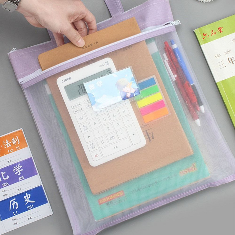 Skolas piederumu caurspīdīga sietiņa maisiņš neilona siets ar rokturi, dubultā rāvējslēdzēja zīmuļa maisiņš Pārnēsājama studentu priekšmetu soma