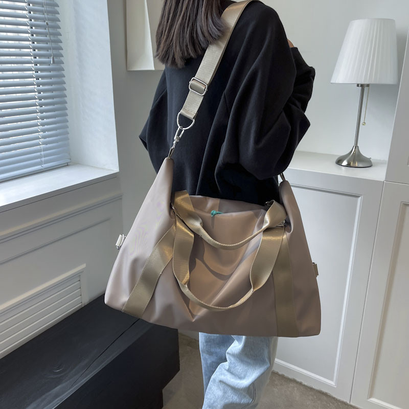 Ūdensnecaurlaidīga Oksfordas auduma rokassomiņa Sieviešu ceļojumu soma Daudzfunkcionāla sieviešu plecu soma Mode Jauna jogas soma ceļojumi