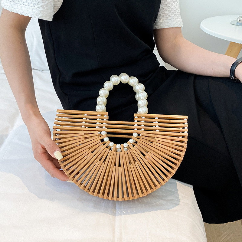 Visokokvalitetna ručna torba od bambusa Dizajn biserne ručke Ženska izdubljena torba za plažu Ljetni odmor Torba od slame Ženska torba