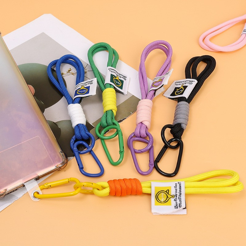 Universāla tālruņa aukla ar piesietu plāksteri, pīts pret pazaudēšanu, īsa plaukstas piekārta virve Rokas aproce Tālruņa šarmu siksnas somas piekariņi