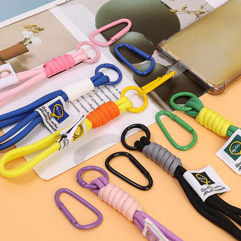 Radoša pītas virves mobilā tālruņa īsa aukla iPhone Airpods Pro Sansung Xiaomi universāla pret pazaudēšanas plaukstas siksnas ķēde