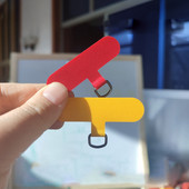 Universālā tālruņa virves piespraudes plāksteris Tālruņa korpuss Spēcīgs un izturīgs starplikas Mobilā tālruņa piesaites kartes vada blīve Plāna fiksēta blīve