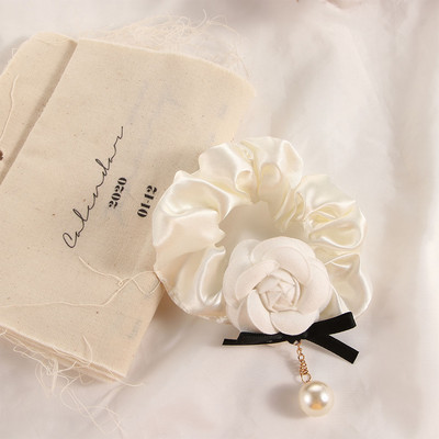 Juukseaksessuaarid Korea pärlriie naistele tüdrukutele elastsed juuksenöörid juuksepaelad Camellia Scrunchies juuksering