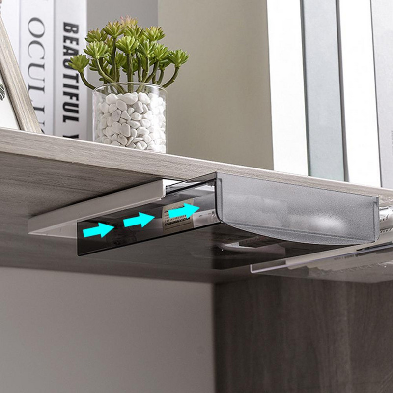 Под чекмеджето на бюрото Поставяща се скрита самозалепваща се плъзгаща се пластмасова пръчка върху чекмеджето Органайзер под бюрото Офис консумативи