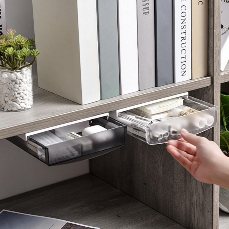 Под чекмеджето на бюрото Поставяща се скрита самозалепваща се плъзгаща се пластмасова пръчка върху чекмеджето Органайзер под бюрото Офис консумативи